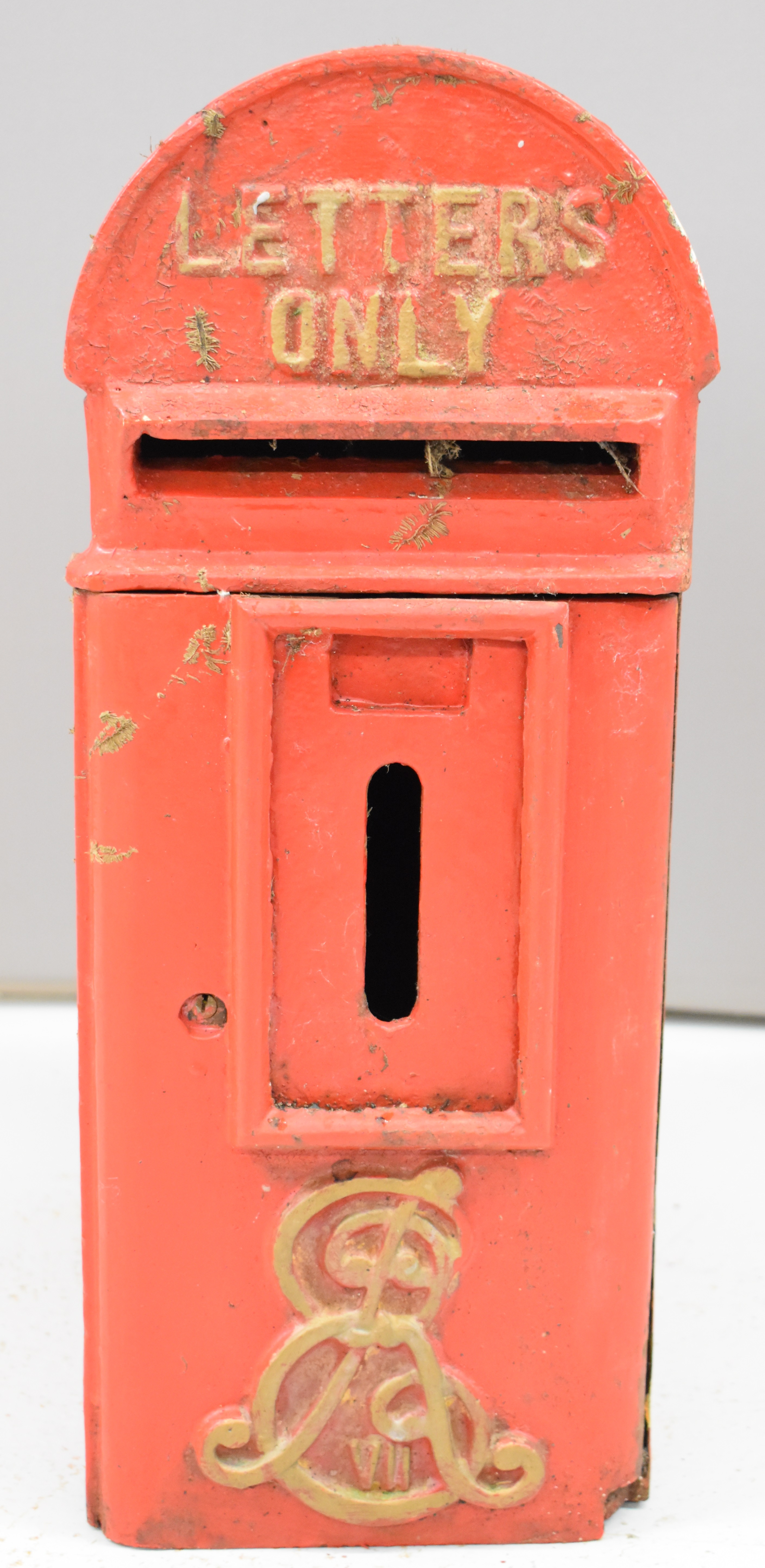 Edward VII style cast iron lamp post mounted letter box with ER VII cypher to lower portion of door,