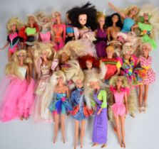 Twenty Mattel Barbie dolls dressed in sport and evening wear, some with accessories.