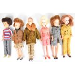 Six vintage Sindy and Paul dolls by Pedigree dressed in original 1960's outfits to include