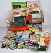 A collection of mostly N gauge model railway scenery, buildings and accessories including hotel,