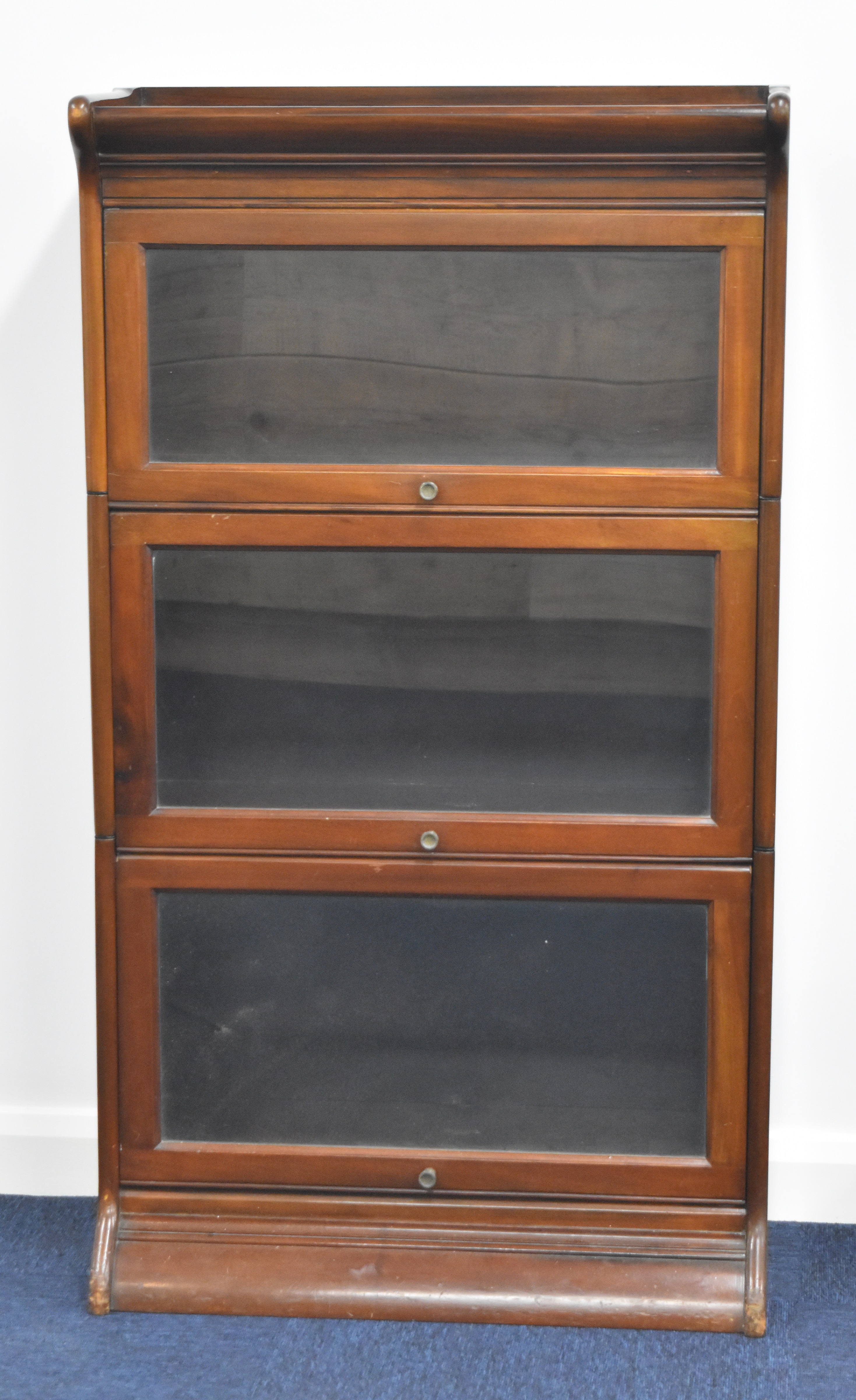 Gumm Globe Wernicke style three section stacking bookcase with glazed up and over doors, W66 x D31 x