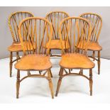 Set of five elm seated Windsor dining chairs with crinoline stretchers and hoop backs and labels