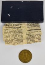 Charlie Chaplin 'The Gold Rush' theatre token for The Queens Picture Theatre, Hollinwood Lancashire