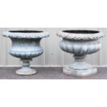 Leonardo Rossi pair of bronze pedestal flared urns with decoration in relief to the rim, diameter 70