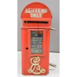 Edward VII style cast iron lamp post mounted letter box with ER VII cypher to lower portion of