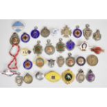 Thirty two hallmarked silver, enamel and other sports medals and badges to include Football