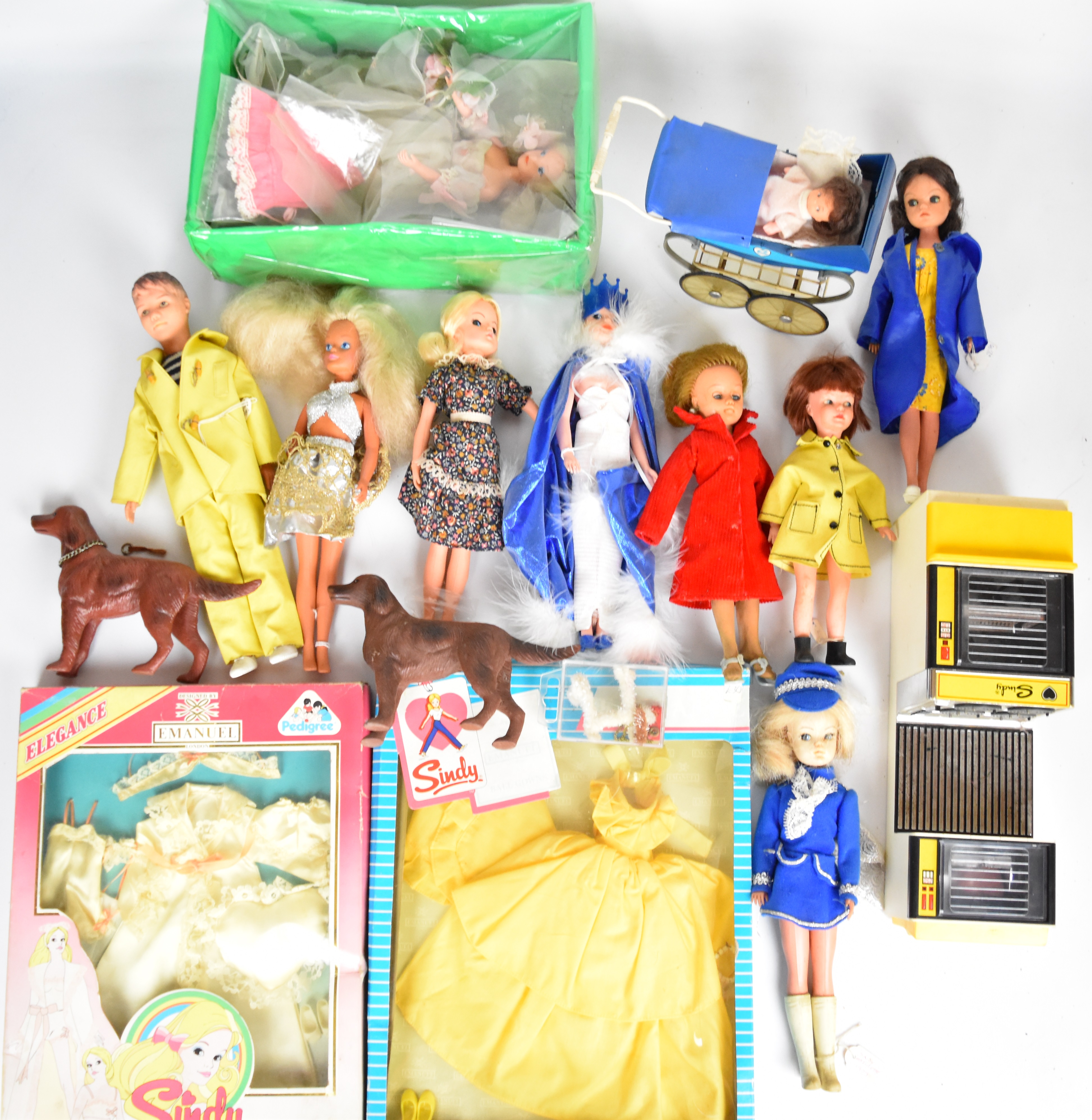 A collection of vintage Sindy dolls, clothing and accessories by Pedigree to include Sindy, Paul and