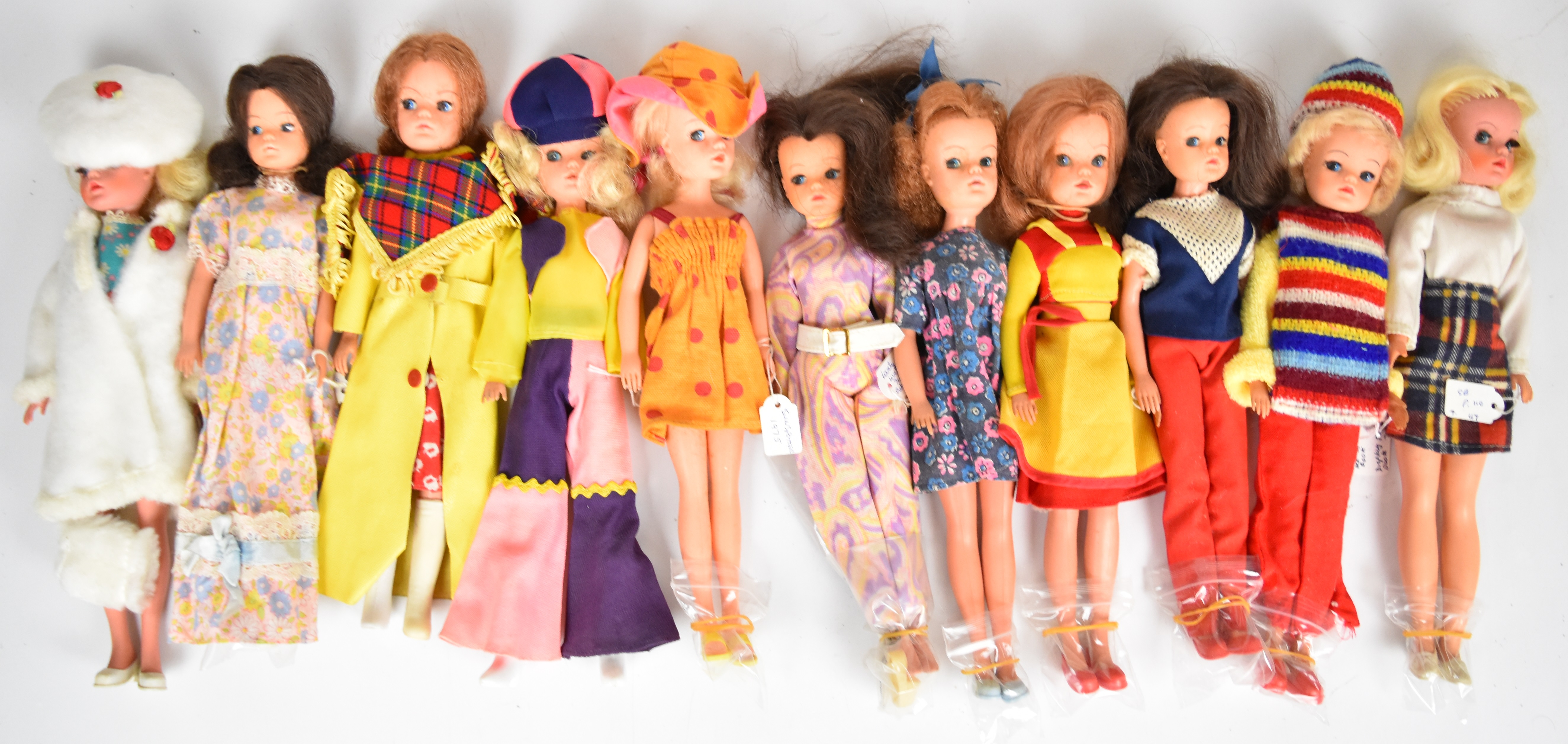 Eleven vintage Sindy dolls by Pedigree dressed in original 1970's outfits to include Sunspotter,