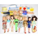 Ten vintage Sindy dolls by Pedigree dressed in 1980's outfits to include Jogger, High Energy,