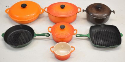 Seven Le Creuset and similar cast iron saucepans, casserole dish and frying pans, maximum diameter