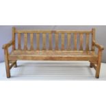 Teak garden bench, overall length 180cm