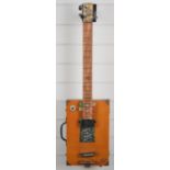 Novelty three string 'cigar box' style electric guitar, 17 frets, length 81cm.