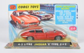 Corgi Toys diecast model 4.2 Litre Jaguar 'E' Type 2+2 car with red body, black interior and