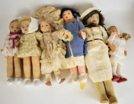 Six Chad Valley felt and cloth covered dolls, each with painted features, tallest 58cm.