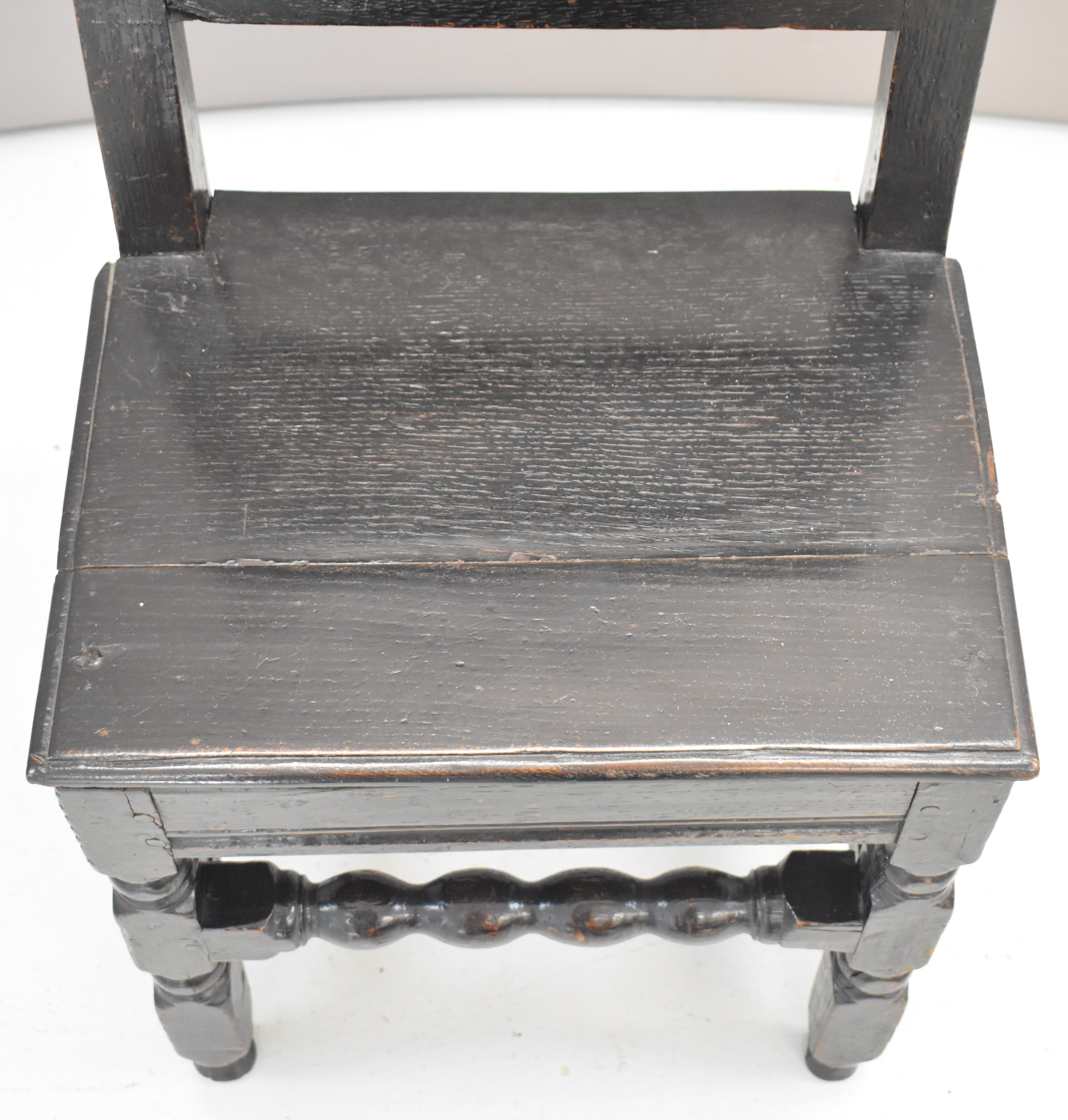 17th / 18thC carved oak peg jointed country chair with plank seat, bobbin strainer and turned - Image 5 of 6