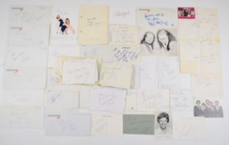 A collection of autographs to include Mick Jagger, Ronnie Wood, Gloria Gaynor, Gary Numan, Peter O'