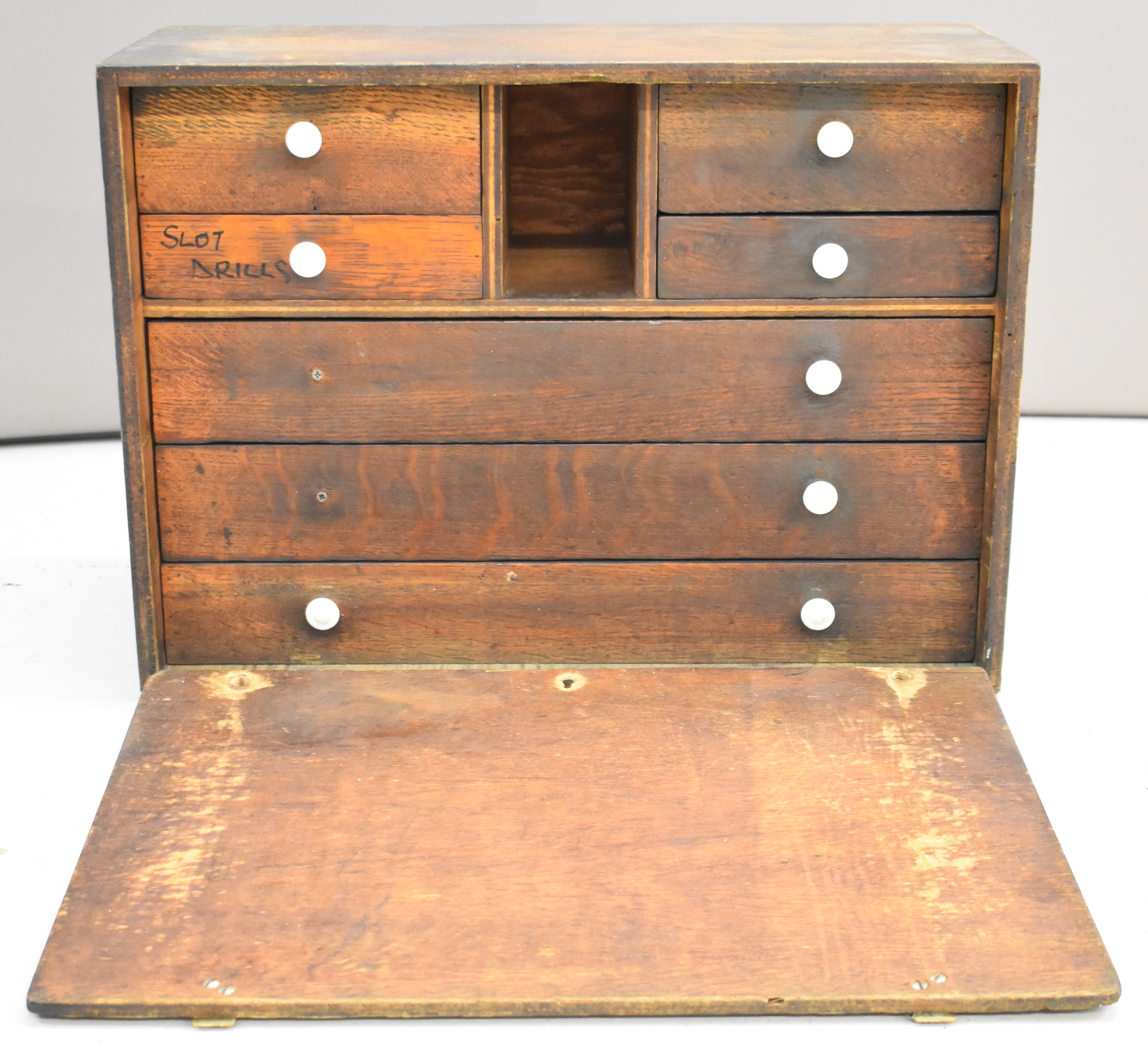 Toolmaker's or collector's chest of drawers comprising four small and three long drawers behind a