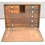 Toolmaker's or collector's chest of drawers comprising four small and three long drawers behind a