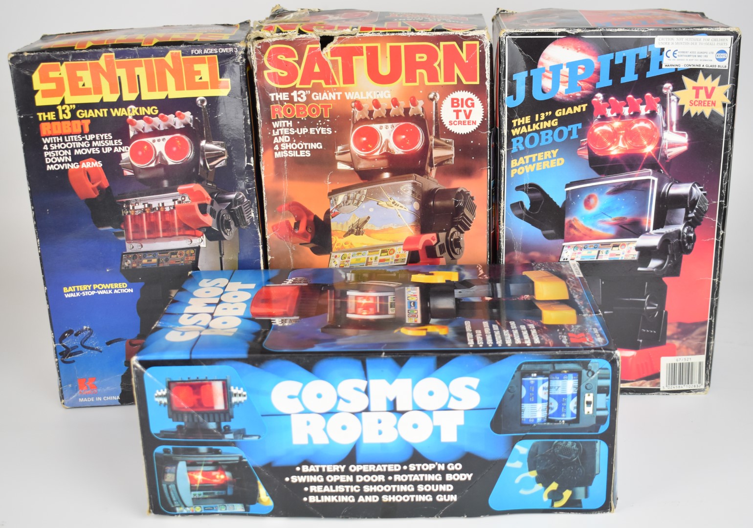 Four Kamco and similar battery operated robots comprising Saturn, Jupiter, Sentinel and Cosmos