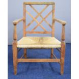 Oak Arts & Crafts rush seated child's or apprentice armchair, height 71.5cm