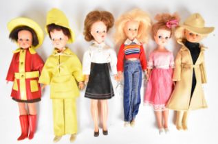 Six vintage Pedigree Sindy Dolls dressed in 1960's / 70's outfits.