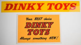 Two Dinky Toys shop advertising signs comprising an acrylic, 10 x 70cm, and a free standing