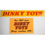 Two Dinky Toys shop advertising signs comprising an acrylic, 10 x 70cm, and a free standing