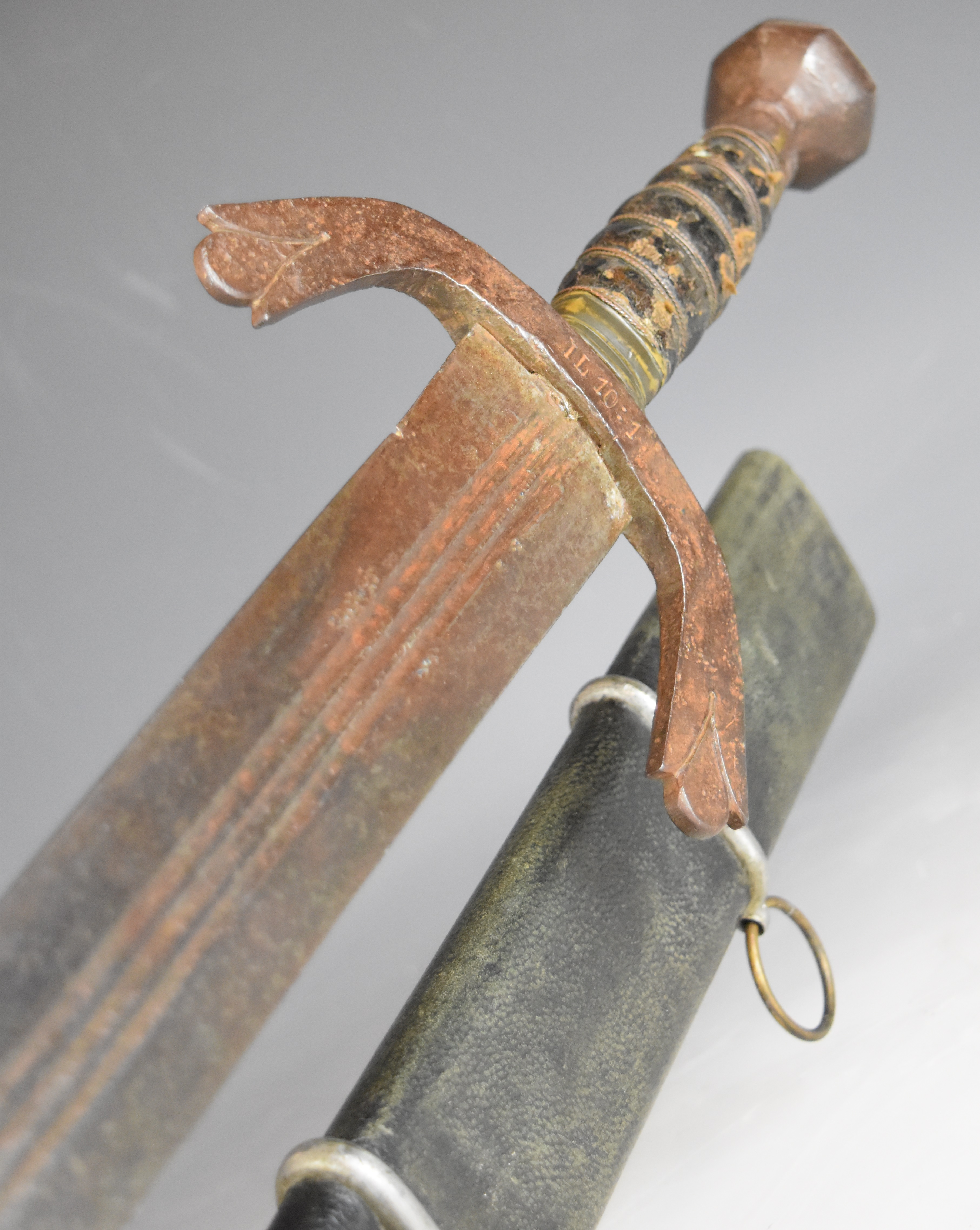 Executioner's sword with leather covered grip, downswept cross guard stamped IL10:1 and K2.3, 85cm