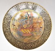 Unusual studio / art pottery pedestal bowl with decoration of a basket of flowers and bullrushes,