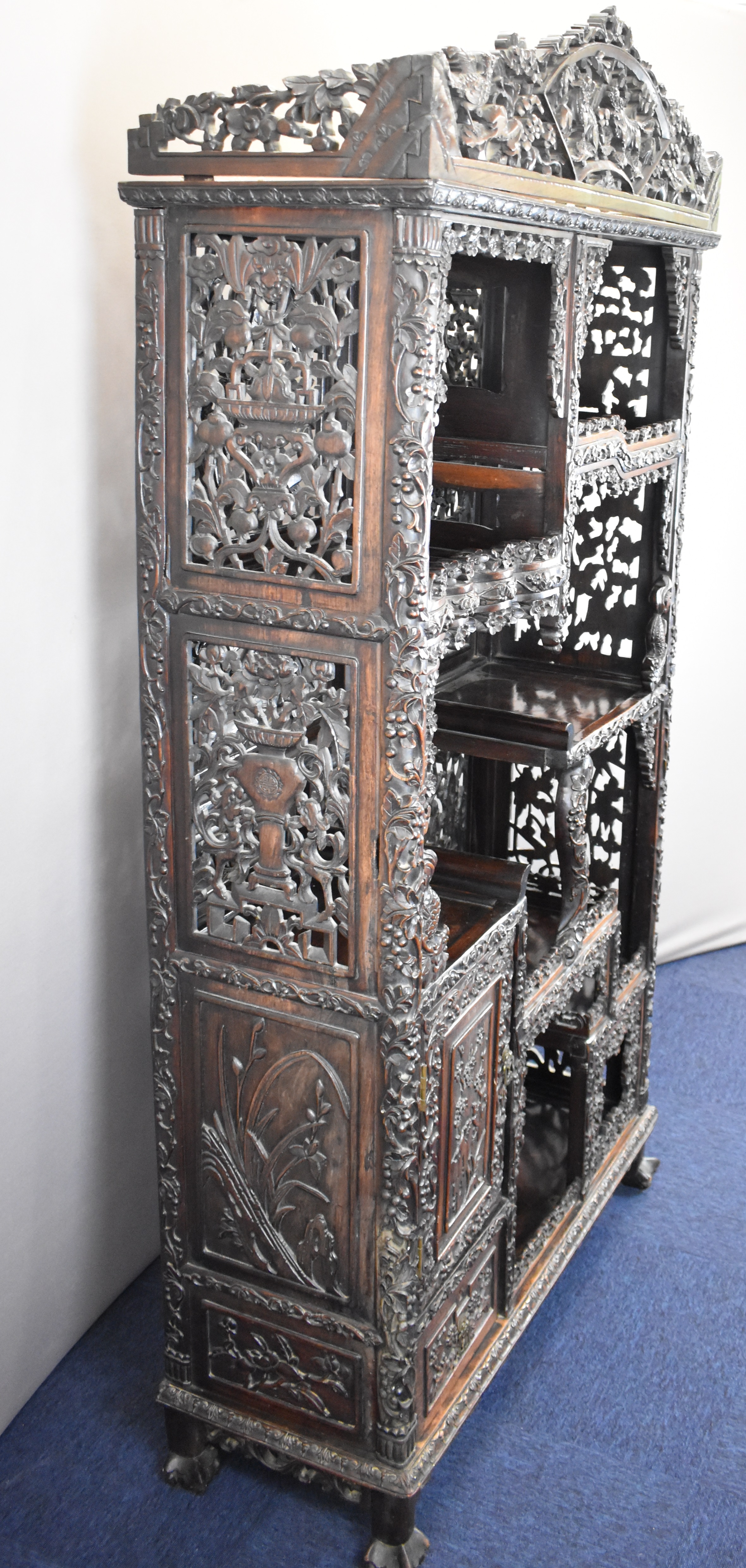 19th / 20thC Chinese carved wood cabinet with an arrangement of tiered and stepped shelves and - Image 5 of 16