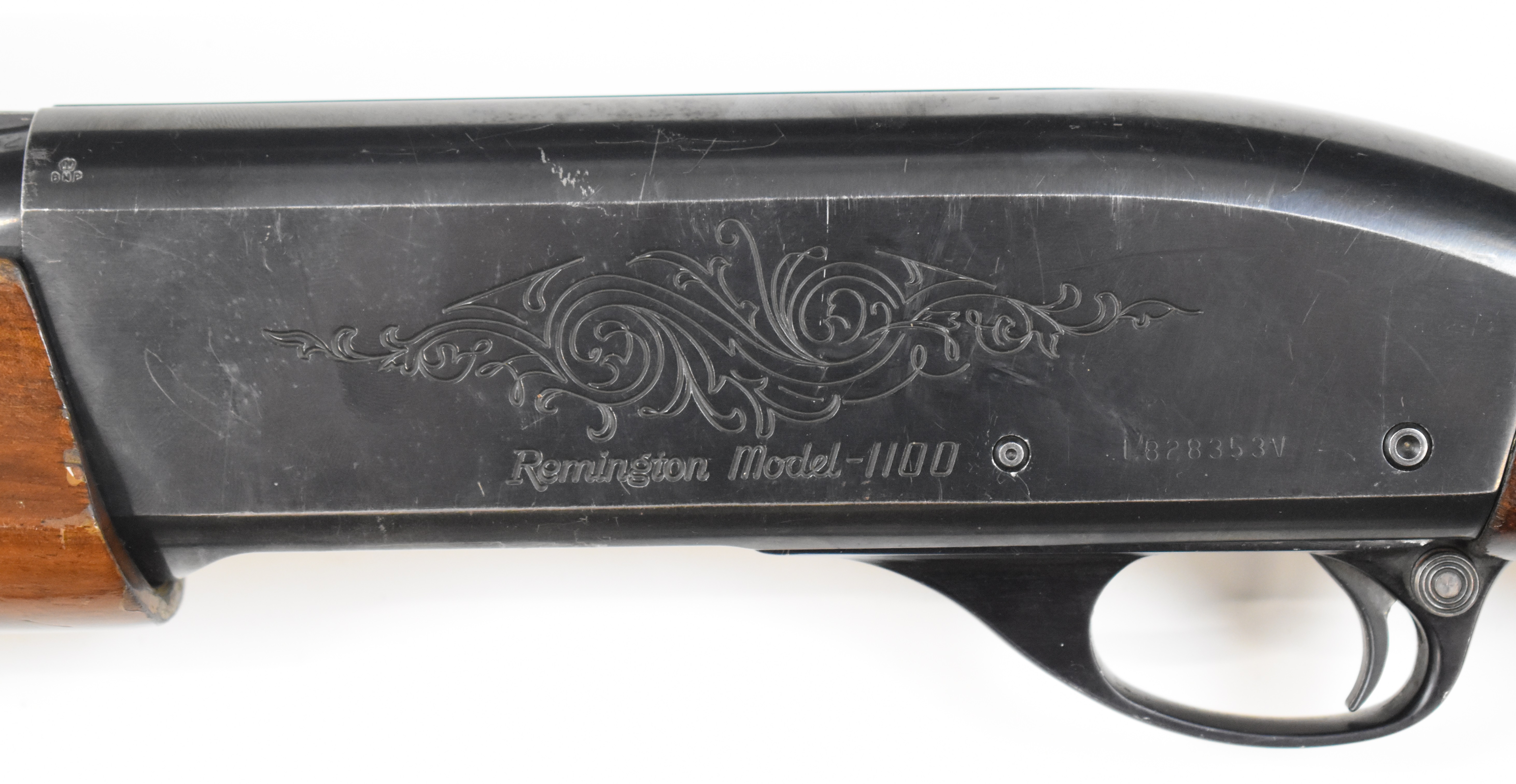 Remington Model 1100 Trap 12 bore 3-shot semi-automatic shotgun with ornately carved and chequered - Image 11 of 11