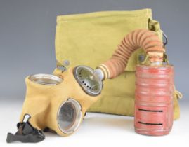 British WW2 respirator / gas mask with cloth cover to face piece and hose, manufacturer W&G Ltd 1941