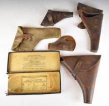 Five leather pistol or revolver holsters including one stamped 'Martins B'ham Ltd 1915' together