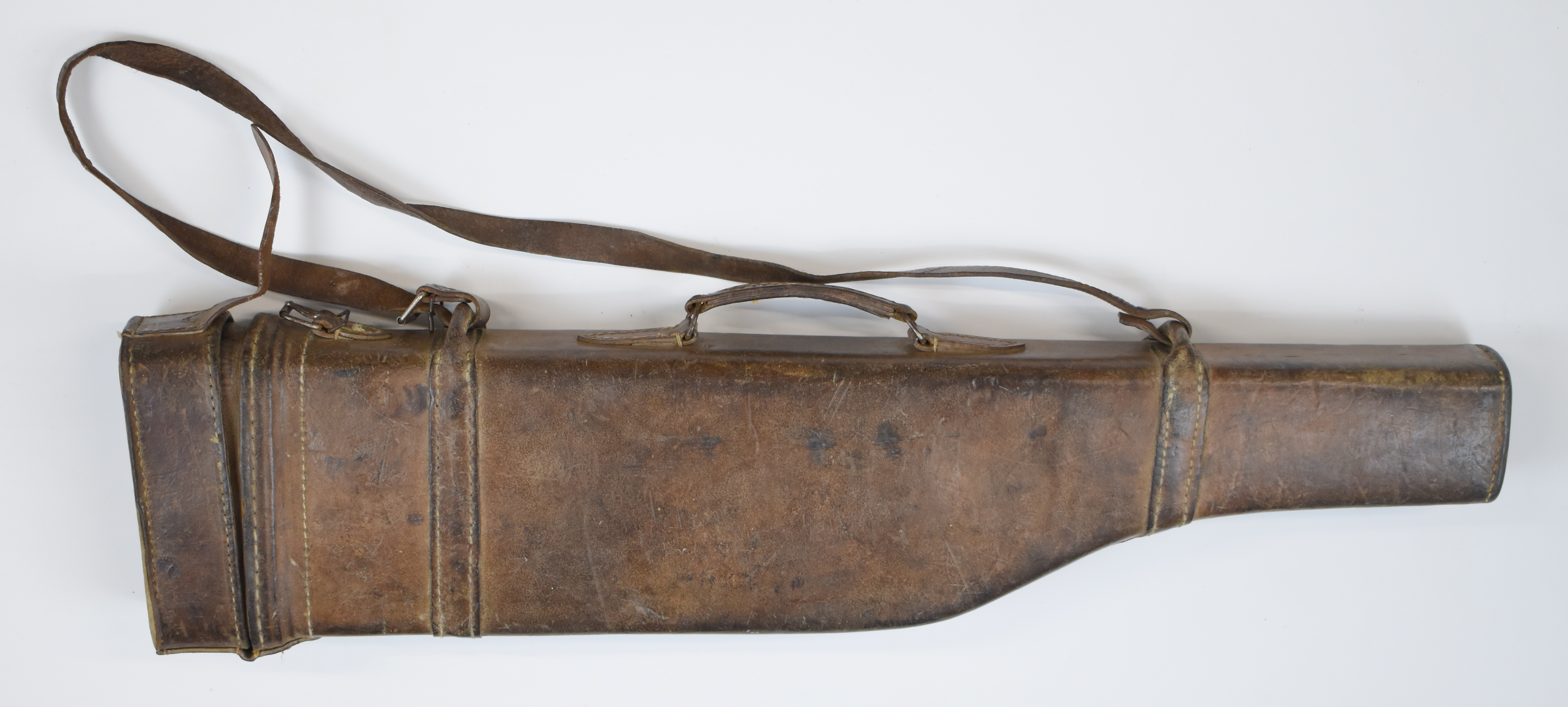 Brown leather 'leg of mutton' shotgun carry case, 73.5cm long.