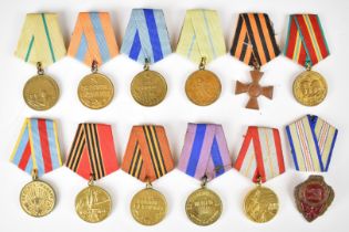 Twelve Russian medals including 1918-1988 70th Anniversary, 1918-1978, 60th Anniversary, 1945-1995
