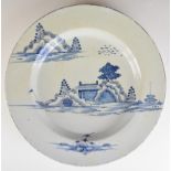 18thC Delft charger with blue chinoiserie decoration, diameter 37cm