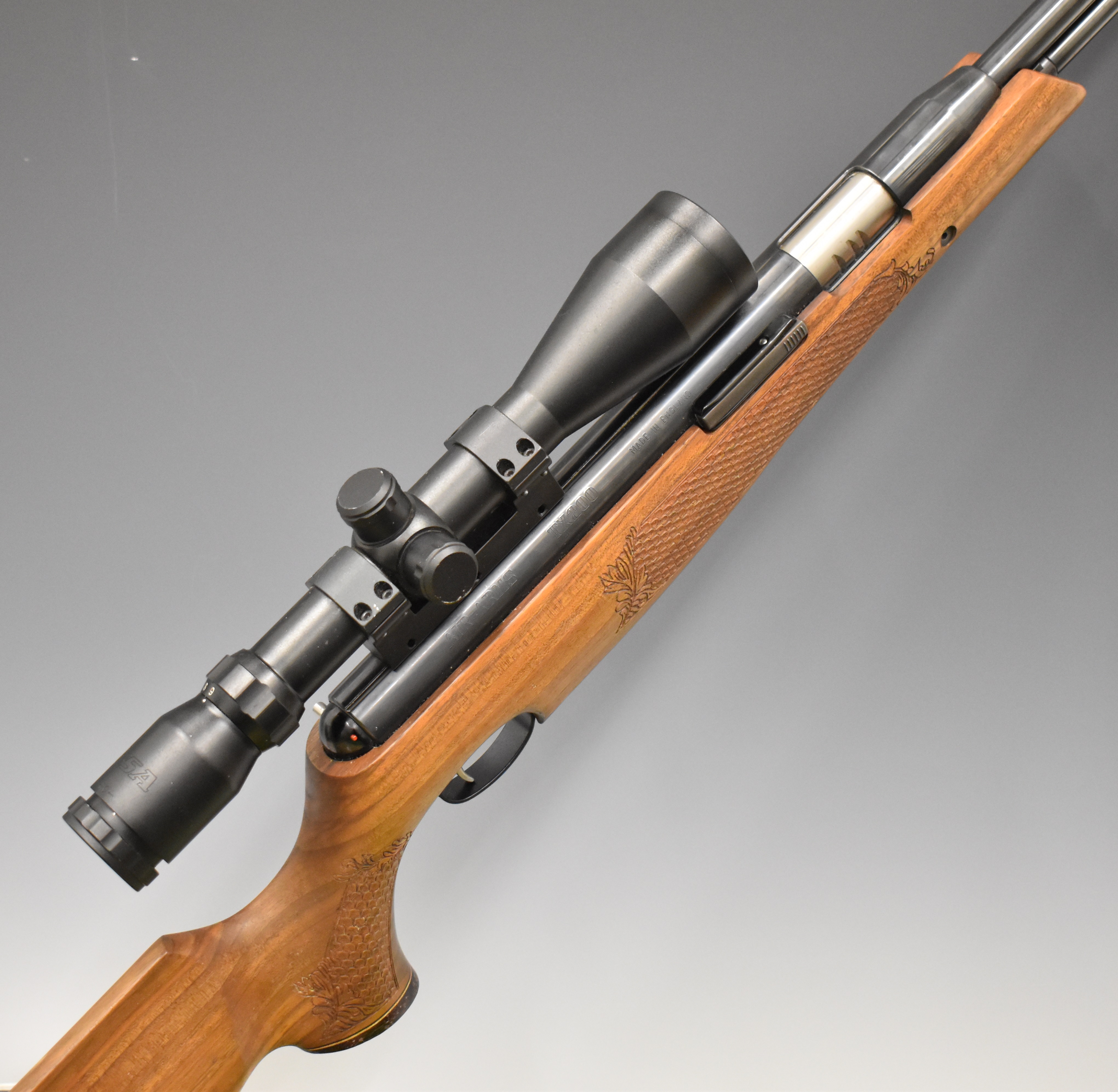 Air Arms TX200 .22 under-lever air rifle with carved semi-pistol grip and forend, adjustable