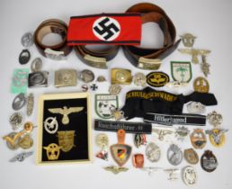 Collection of approximately 40 copy WW2 Nazi Third Rich badges, insignia, belts etc, including