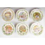 Twenty four Royal Doulton Brambly Hedge plates including year plates, Primrose's Adventure Series,