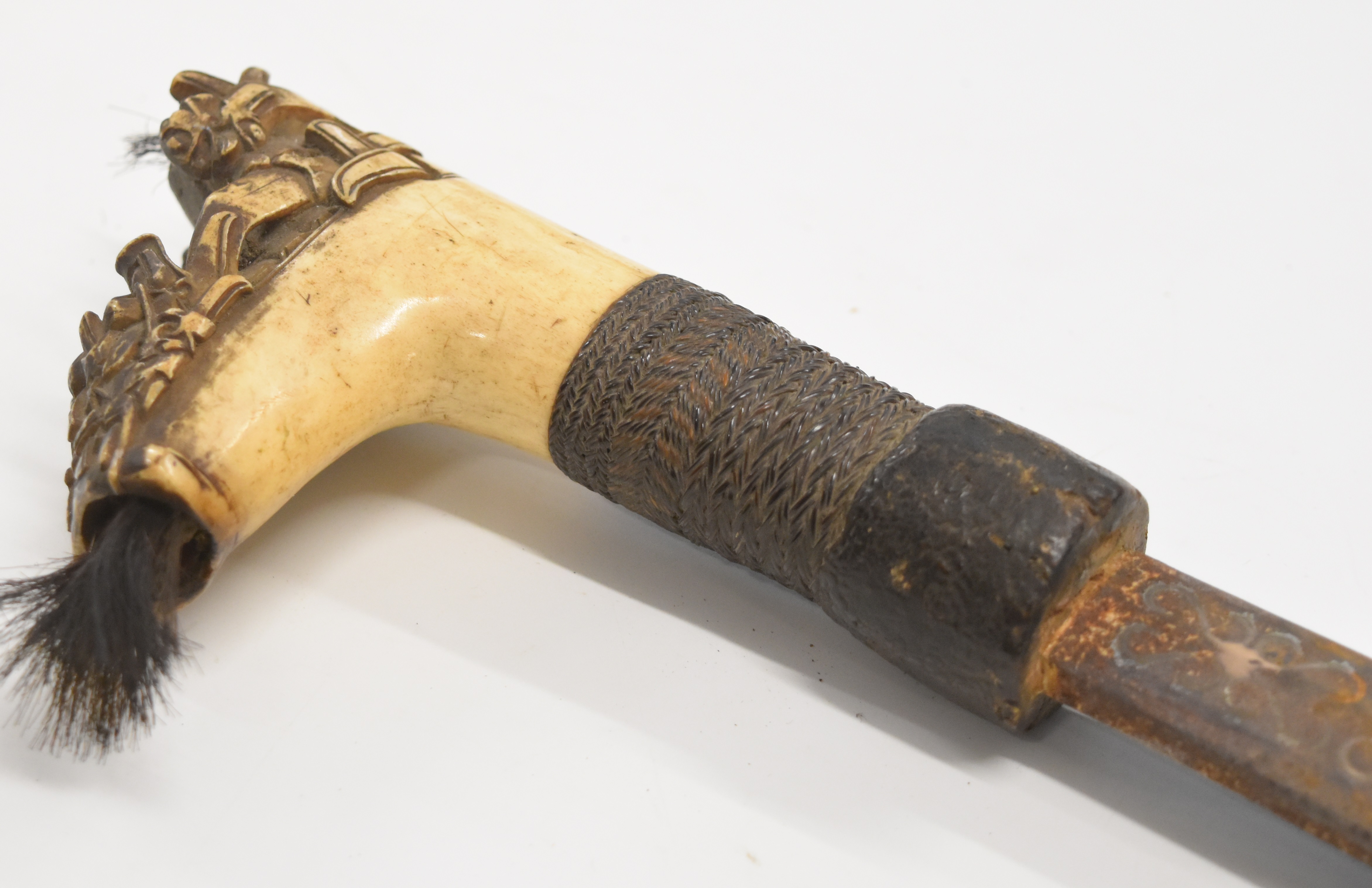 Borneo Dayak headhunter's sword with heavily carved bone hilt, hair plumes, coin inset grip, - Image 3 of 9