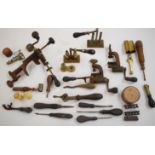 A collection of gunsmith tools and equipment including shotgun cartridge re-loading tools, Nimrod 12