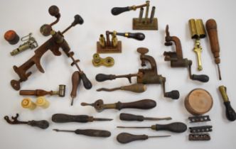 A collection of gunsmith tools and equipment including shotgun cartridge re-loading tools, Nimrod 12