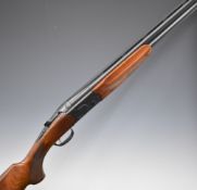 Beretta 686 Onyx 12 bore over and under ejector shotgun with named lock and underside, chequered