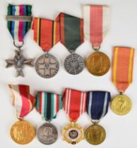 Nine Polish WW2 and later medals including Armed Forces In The West with clasp for Polonia, medal