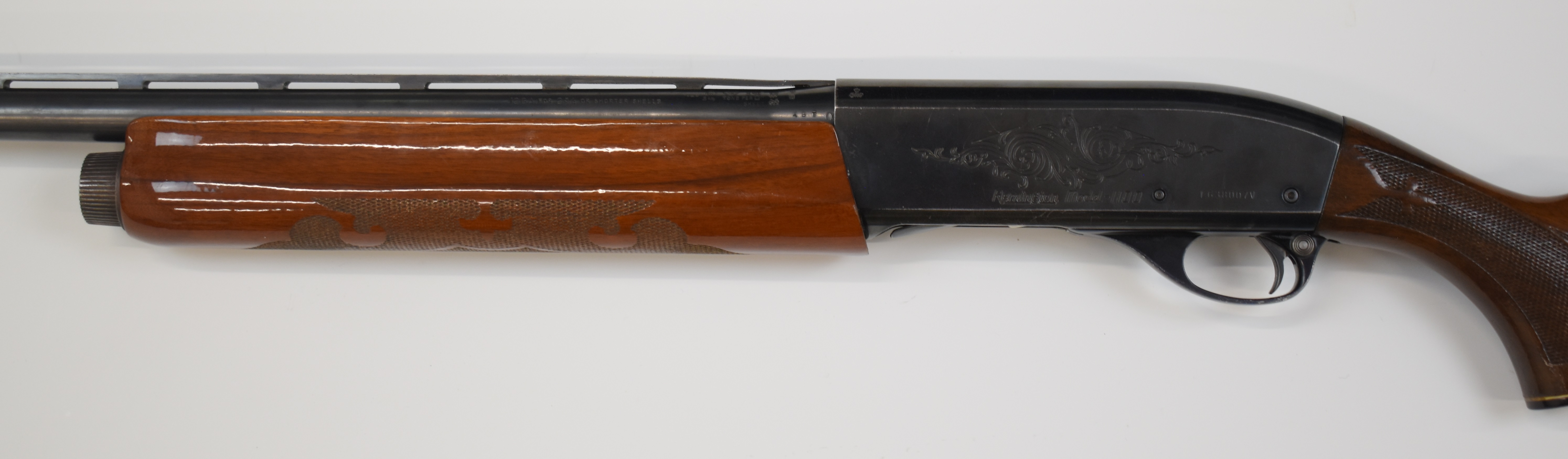 Remington Model 1100 12 bore 3-shot semi-automatic shotgun with ornately carved and chequered semi- - Image 8 of 10