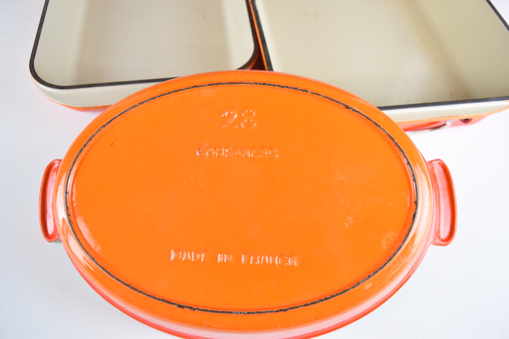 Ten items of Le Creuset cast iron cook ware in Volcanic Orange, to include lidded saucepans, milk - Image 8 of 8