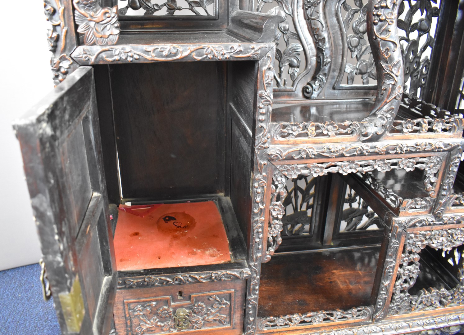 19th / 20thC Chinese carved wood cabinet with an arrangement of tiered and stepped shelves and - Image 12 of 16