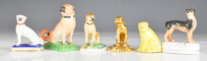 Collection of 19thC miniature porcelain / pottery pug figures including Crown Derby, tan example