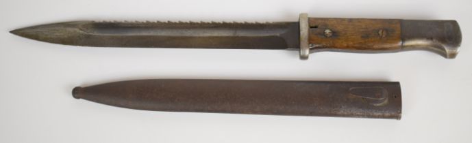 German 84/98 pattern bayonet with flash guard, E12065 to pommel, 25cm saw back fullered blade and