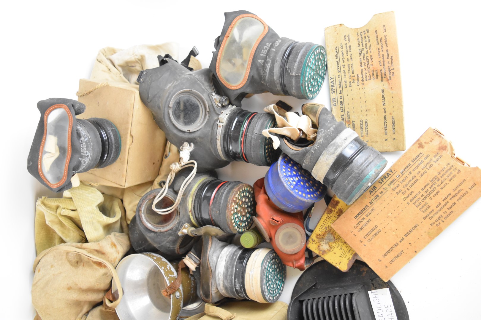 Ten various British WW2 gas masks / respirators including a child's example with metal storage tin - Image 2 of 3